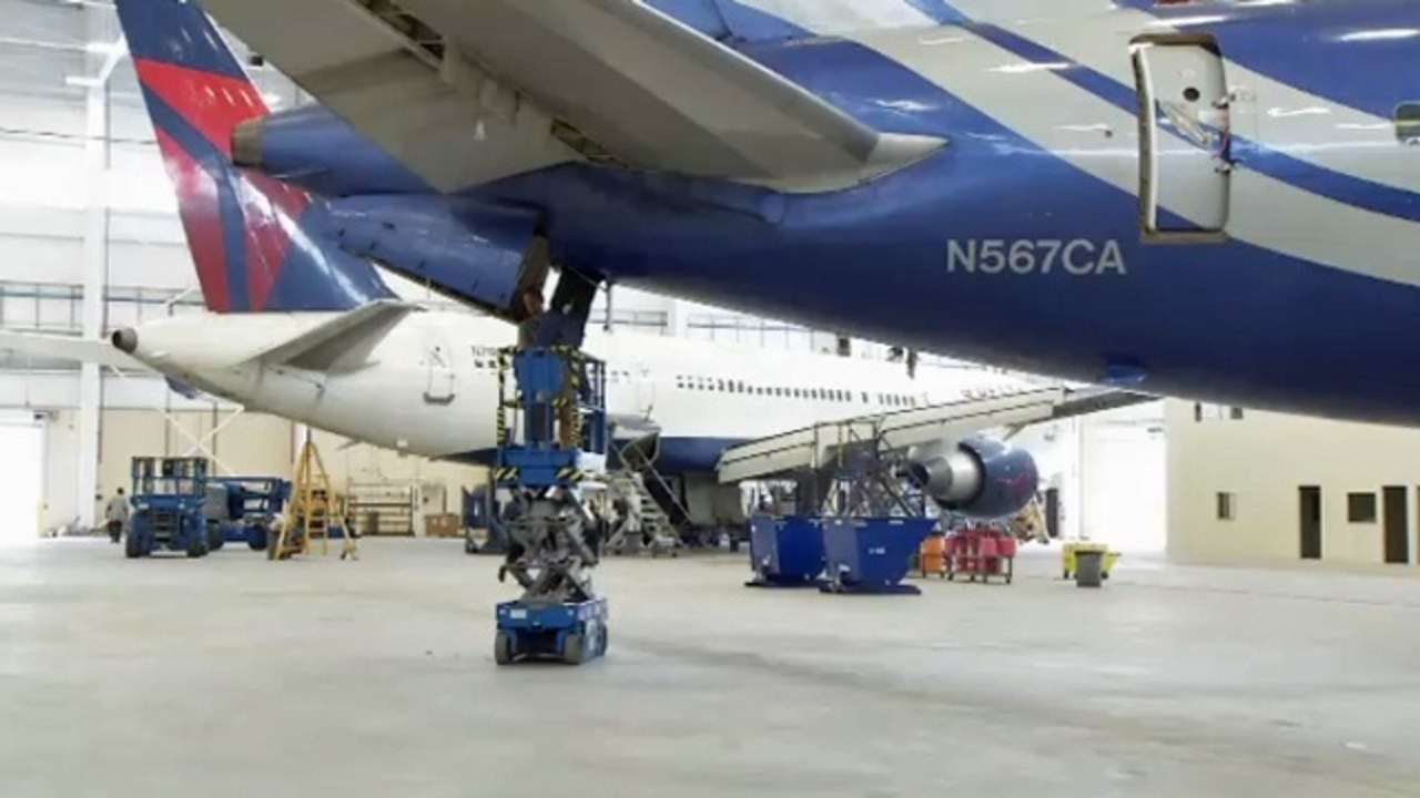 New hangar opens, brings 300 jobs to Cecil Airport