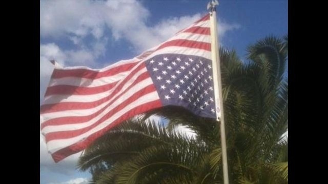 Marine Corp vet flies flag upside down in protest