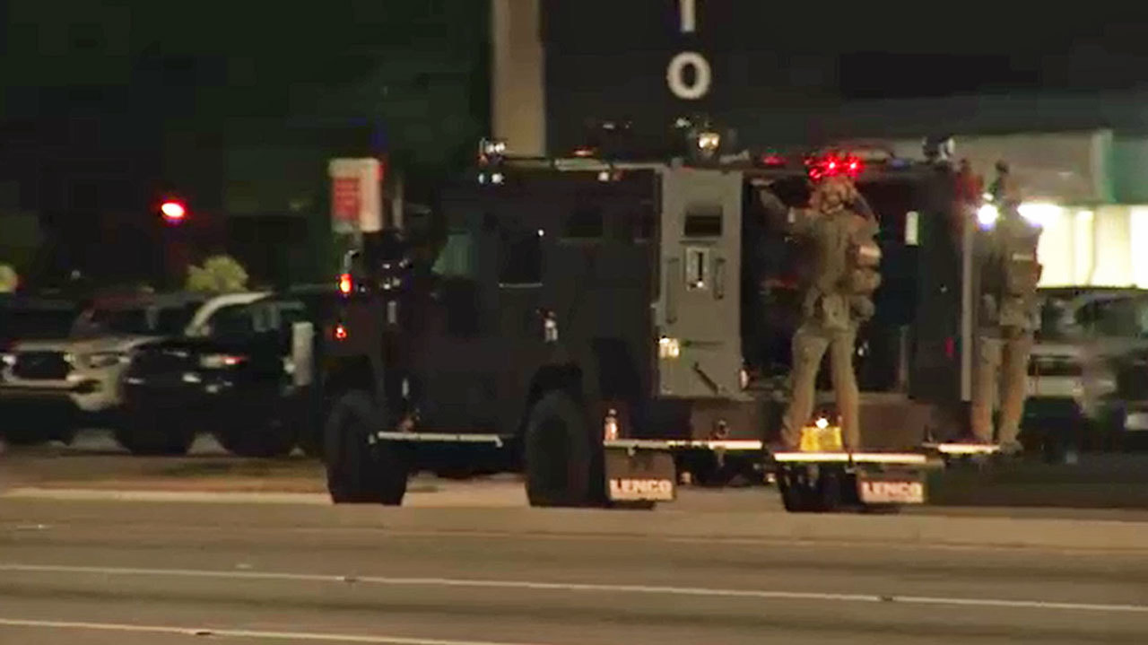 SWAT standoff ends with officerinvolved shooting